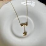 Dangling Daisy Bow Necklace - Image 2